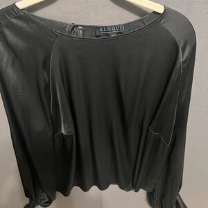 Eloquii Elegant Black Blouse with balloon sleeves.